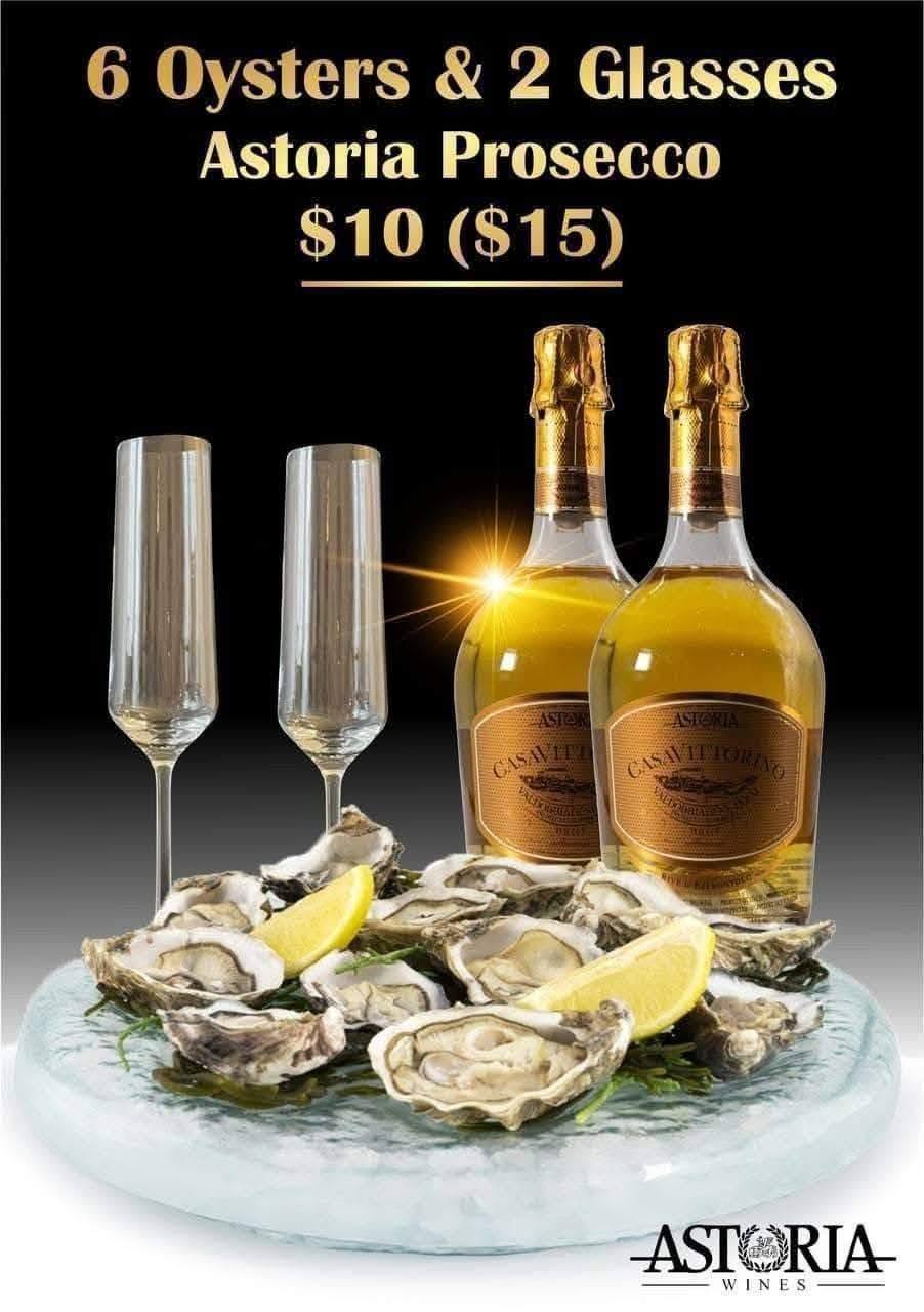 six oysters with Prosecco and champagne flutes